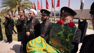 ادای احترام خادمین امام رضا(ع) به شهدای مقاومت در محل شهادت حاج قاسم سلیمانی